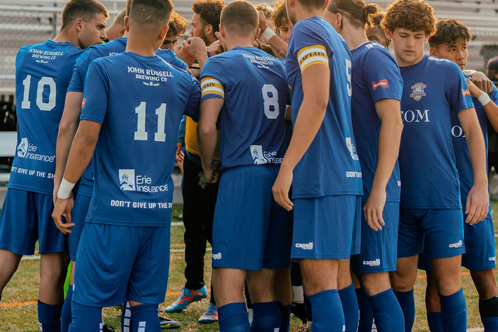 Mens team huddle